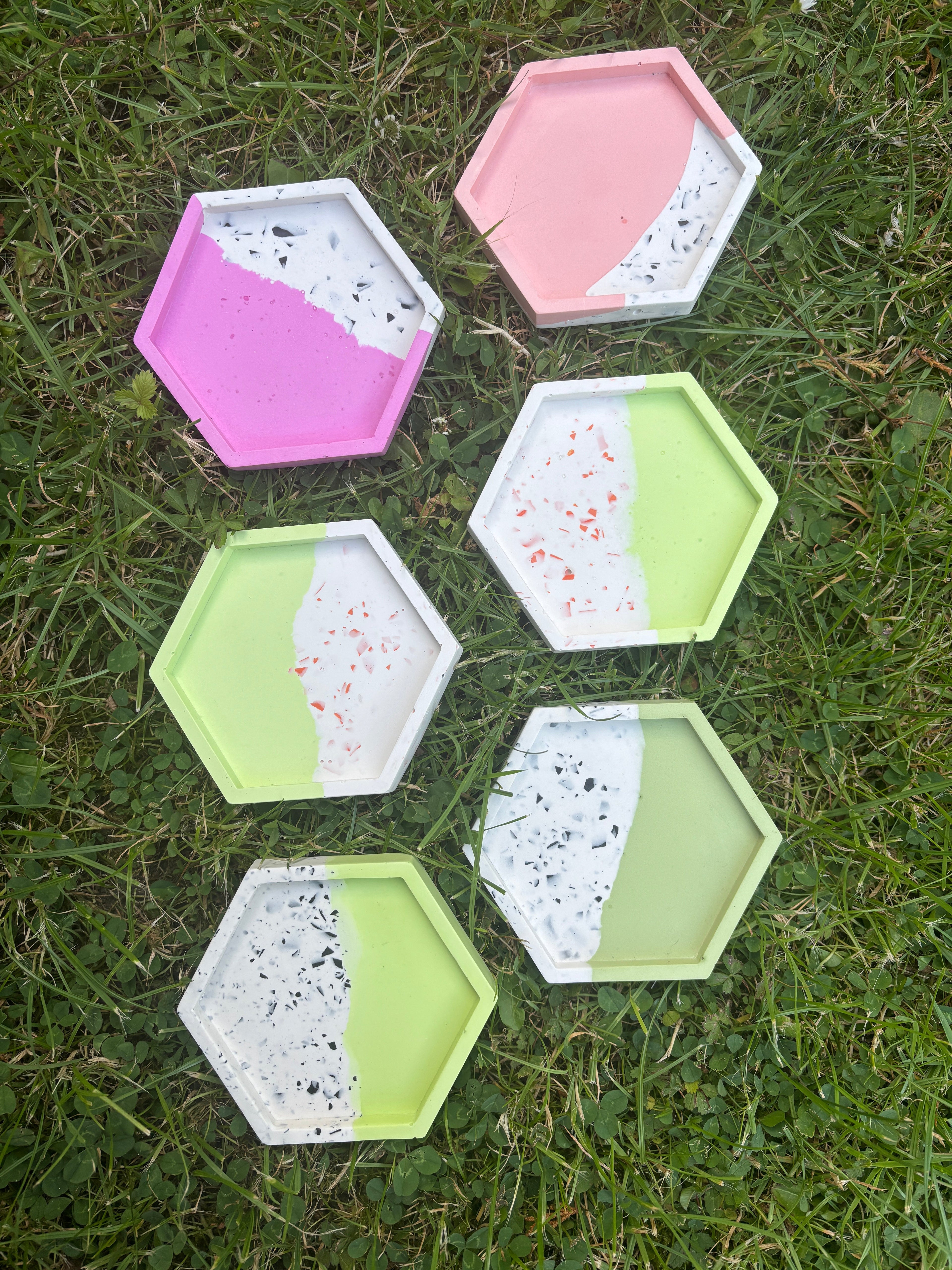 A collection of handmade trinket trays in various shapes and colours.
