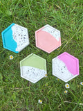 Block colour split terrazzo hexagon trays.