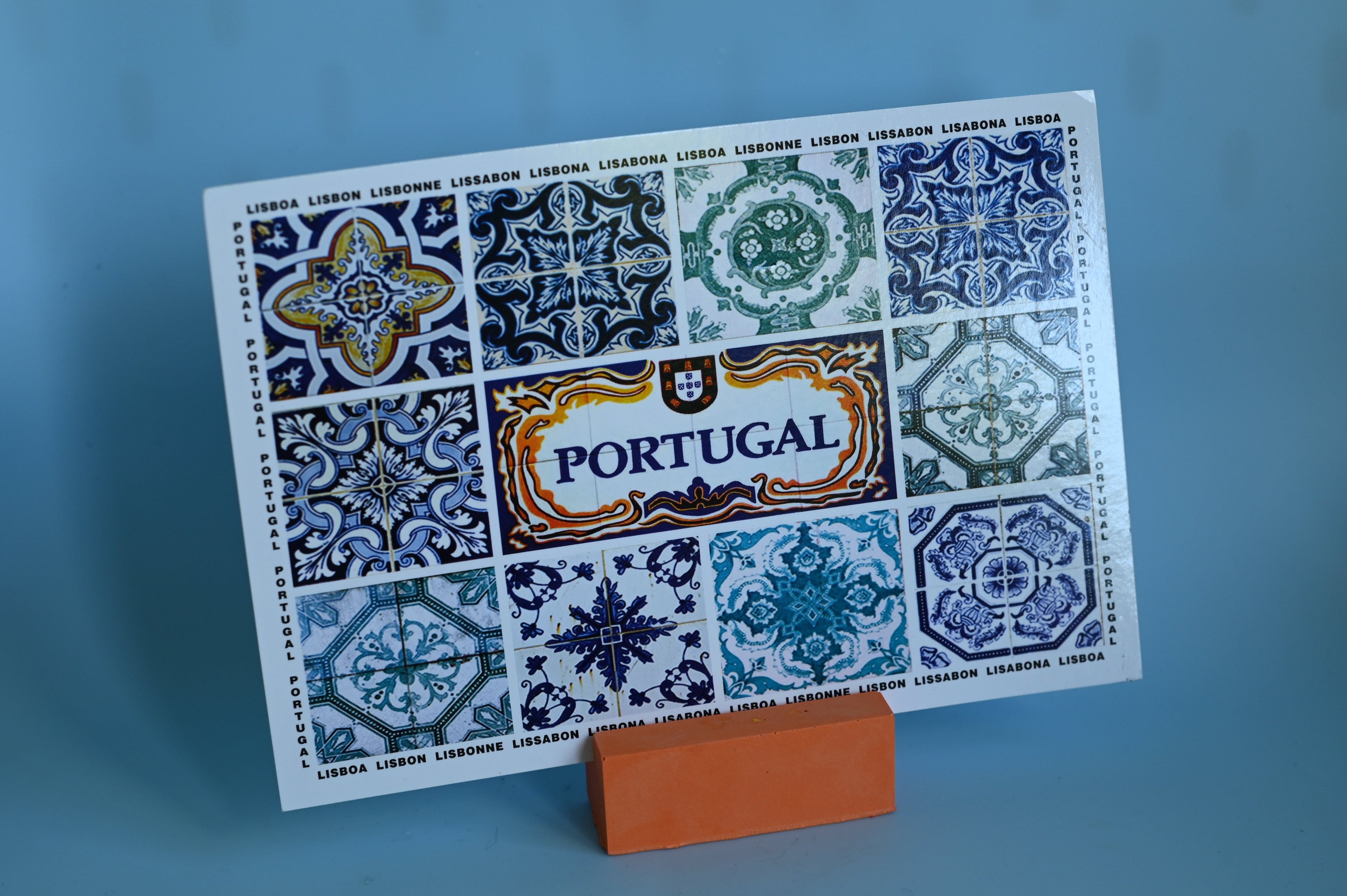 orange photo holder with postcard