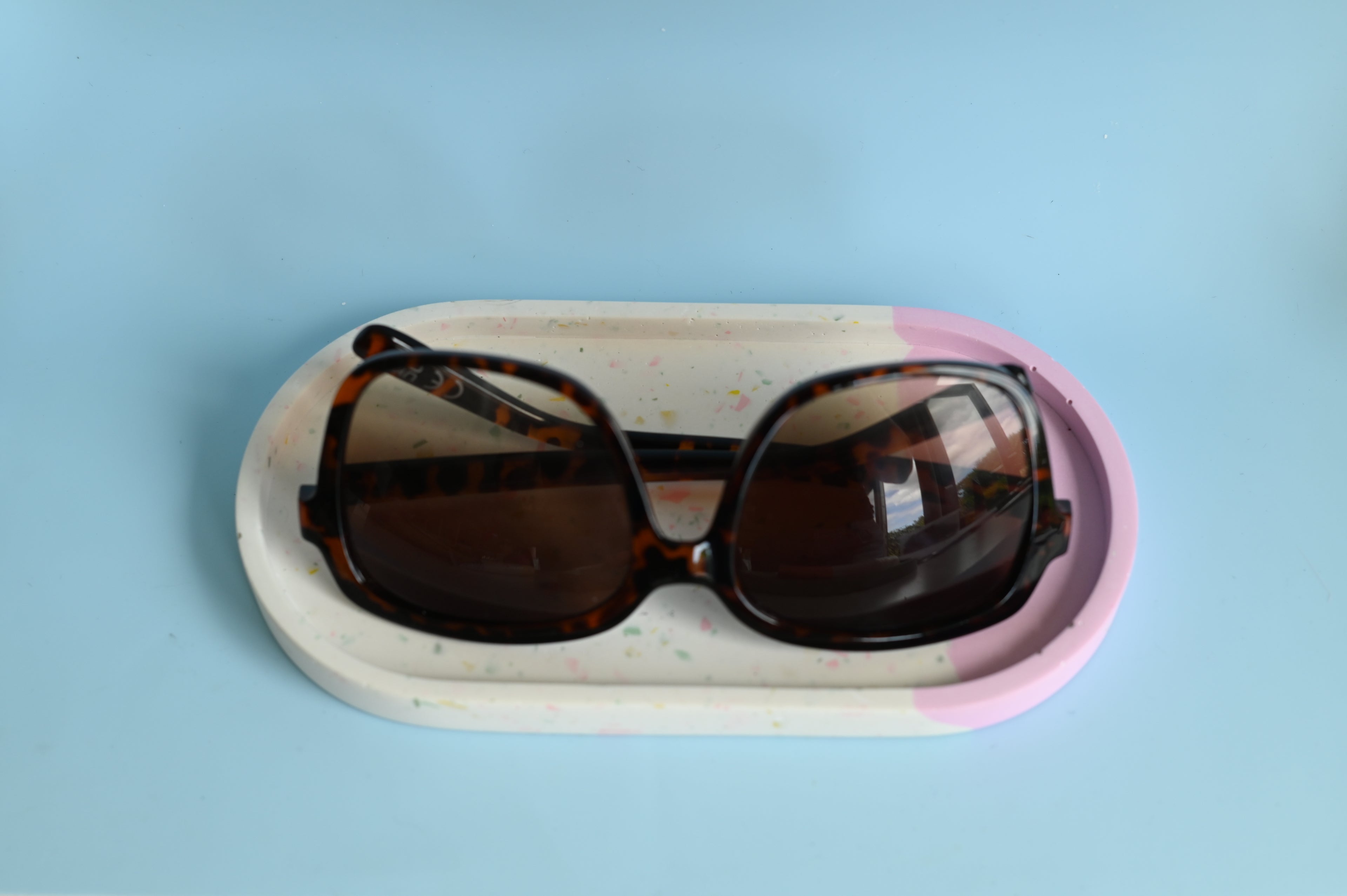 multicolour_terrazzo_oval_tray with sunglasses on